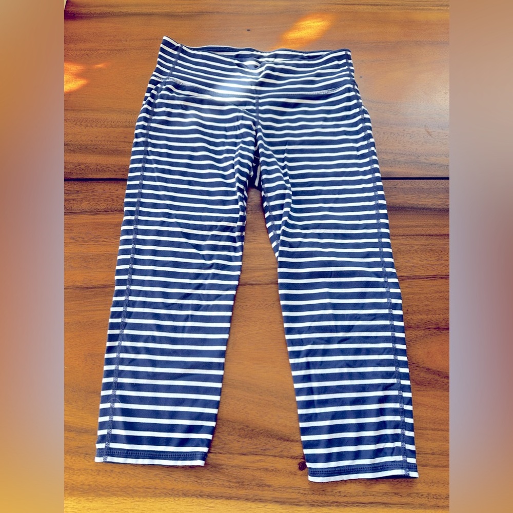 Cute Athleta navy blue and white, striped, athletic pants. Very stretchy!